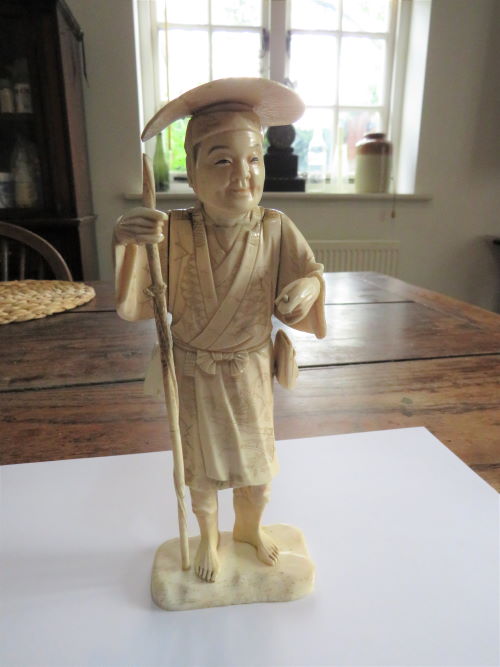 Ivory figure now fully restored
