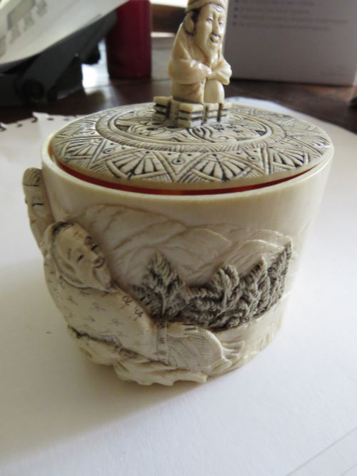 late edo period ivory pot circa (1603 to 1868 with netsuke figure