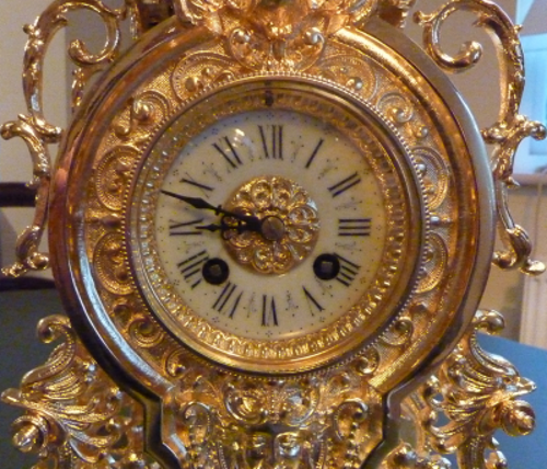 gilded clock dial after restoration