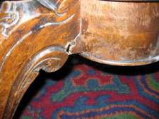 Antique table leg before renovation